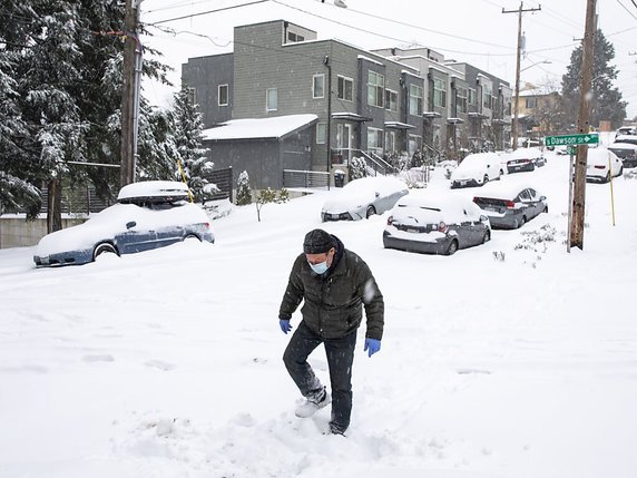 Une épaisse couche de neige recouvre actuellement Seattle (image d'illustration). © KEYSTONE/AP/Bettina Hansen