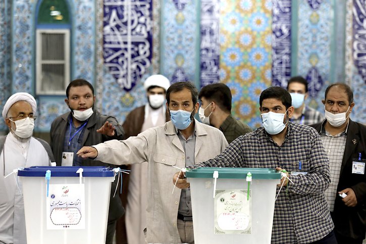 Seuls quatre candidats sont en lice à l'élection présidentielle iranienne. © KEYSTONE/AP/Ebrahim Noroozi