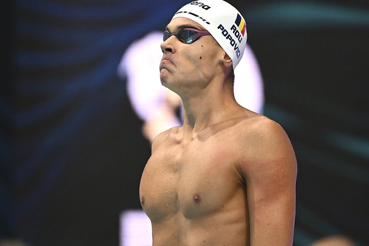 David Popovici a battu le record d'Europe du 100 m libre vendredi © KEYSTONE/AP/ANNA SZILAGYI